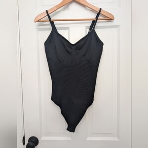 Large black bodysuit